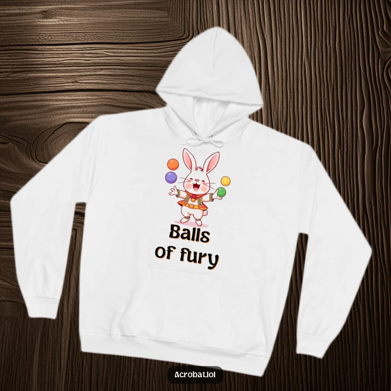 Funny Rabbit Hoodie: A cheerful rabbit in athletic attire juggles colorful balls, providing warmth and a dose of lighthearted fun.